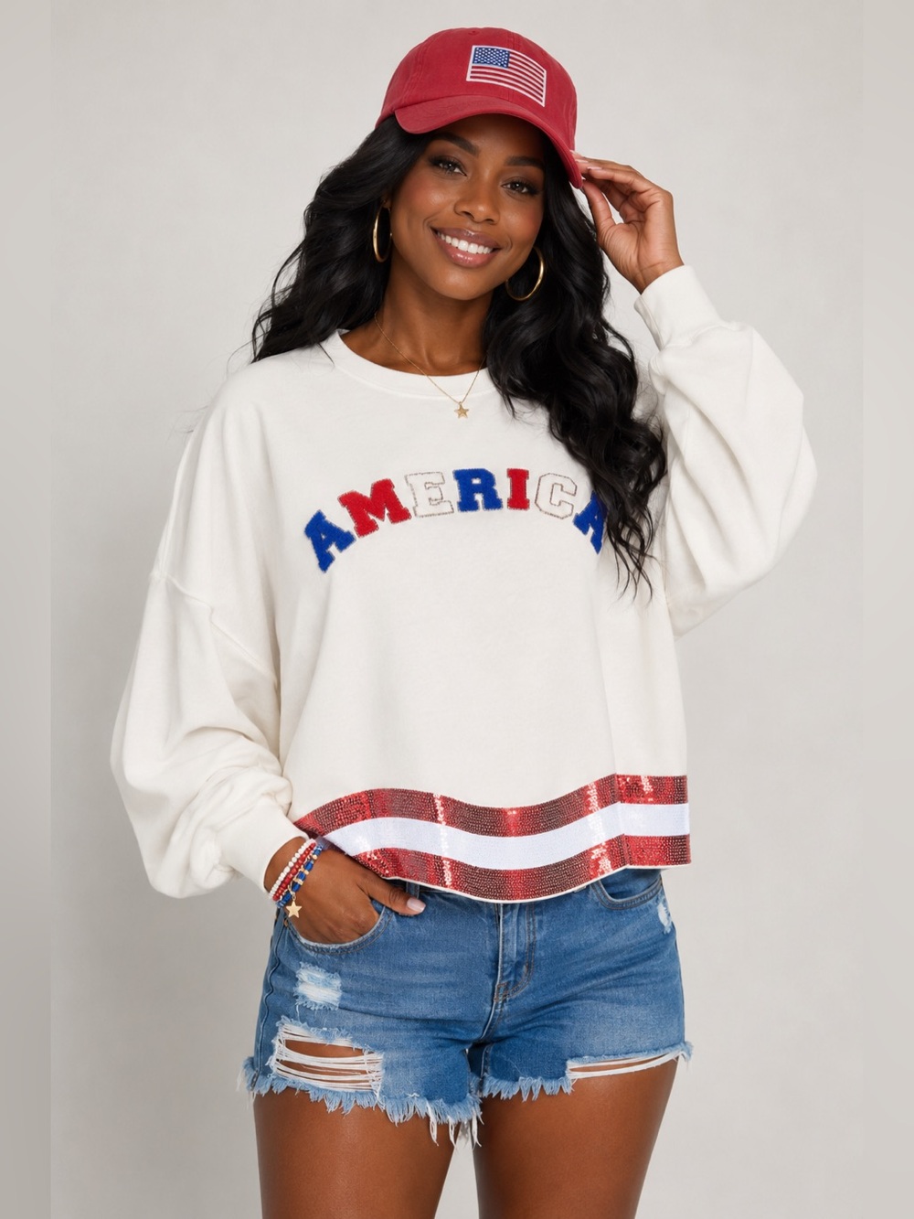 THE AMERICANA CREW LONG SLEEVE SEQUIN CROP PULLOVER SWEATER
White - Picture 1 of 12